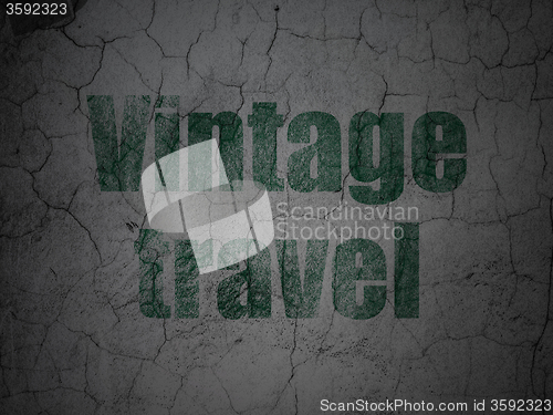 Image of Vacation concept: Vintage Travel on grunge wall background