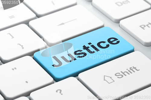 Image of Law concept: Justice on computer keyboard background