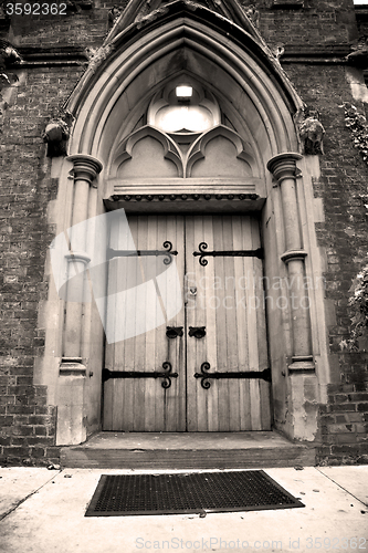 Image of wooden parliament in london old church door and marble antique  