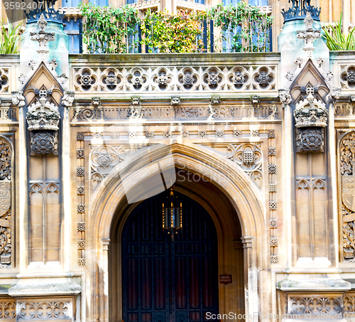 Image of parliament in london old church door and marble antique  wall