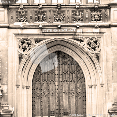 Image of parliament in london old church door and marble antique  wall