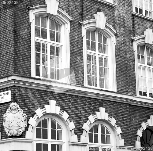 Image of window in europe london old red brick wall and      historical 