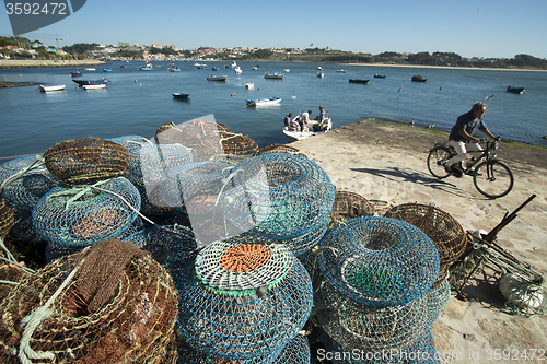 Image of EUROPE PORTUGAL PORTO BEACH COAST ATLANTIC FISHING