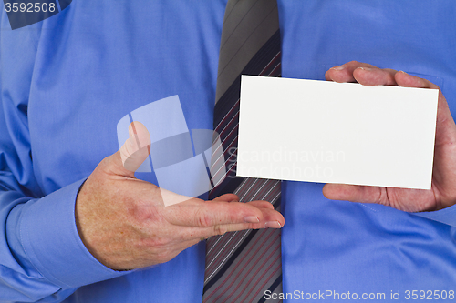 Image of Businessman with blank white card