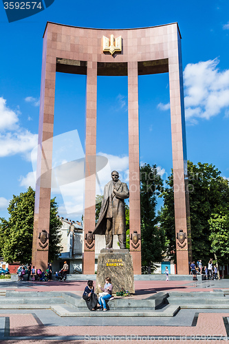 Image of monument of national Ukrainian hero S. Bandera and great trident