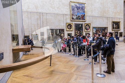 Image of Visitors take photo of Leonardo DaVinci\'s \"Mona Lisa\" at the Lou