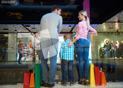 Image of young family with shopping bags