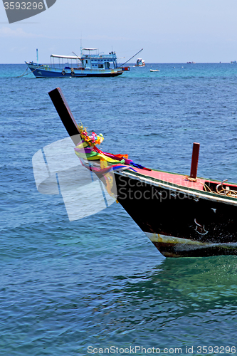 Image of  boat prow blue lagoon  stone in   sea
