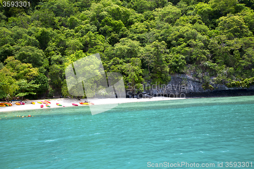 Image of  boat coastline of a  green lagoon and   thailand kho 