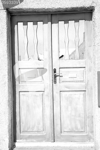Image of blue door in antique village santorini greece europe and white w
