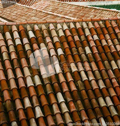 Image of minaret old moroccan  tile roof in the old city 