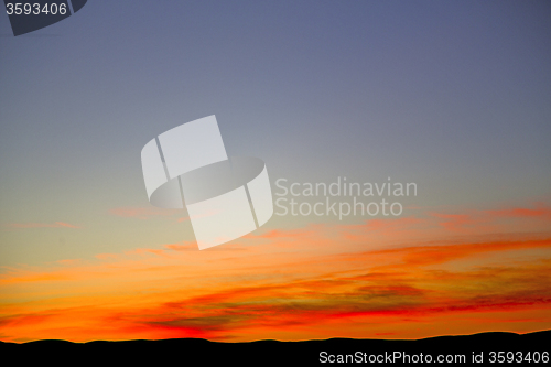 Image of the sunrise in  mountain  background
