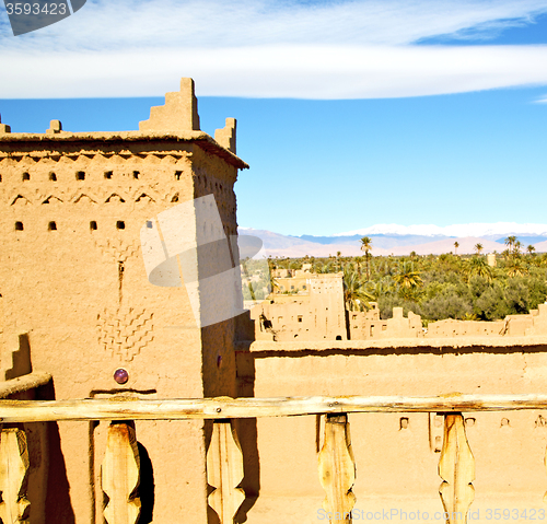 Image of brown old  construction in  africa morocco and  clouds  near the