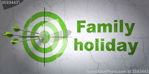 Image of Tourism concept: target and Family Holiday on wall background