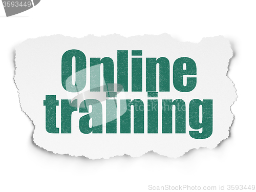 Image of Learning concept: Online Training on Torn Paper background