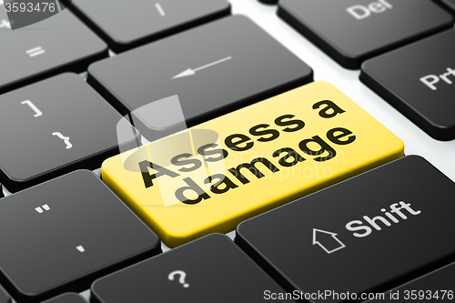 Image of Insurance concept: Assess A Damage on computer keyboard background