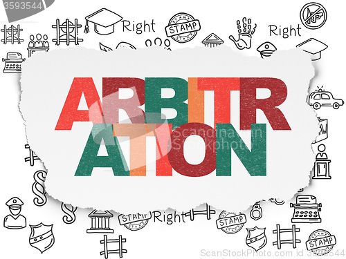 Image of Law concept: Arbitration on Torn Paper background