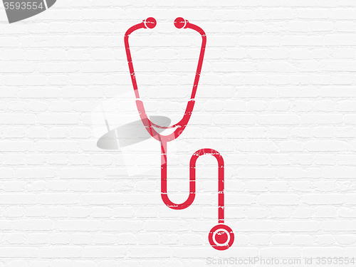 Image of Healthcare concept: Stethoscope on wall background