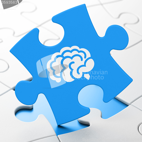 Image of Science concept: Brain on puzzle background