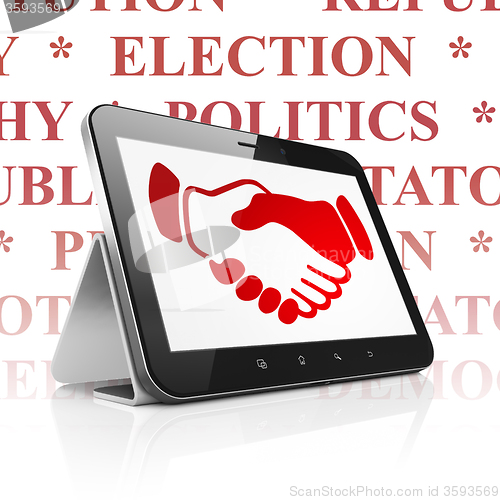 Image of Political concept: Tablet Computer with Handshake on display