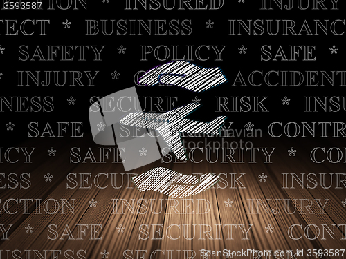 Image of Insurance concept: Airplane And Palm in grunge dark room