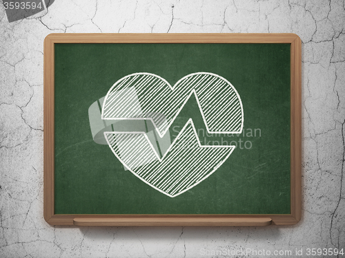 Image of Healthcare concept: Heart on chalkboard background