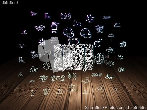 Image of Tourism concept: Bag in grunge dark room