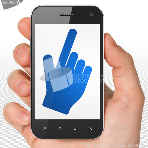 Image of Social network concept: Hand Holding Smartphone with Mouse Cursor on display