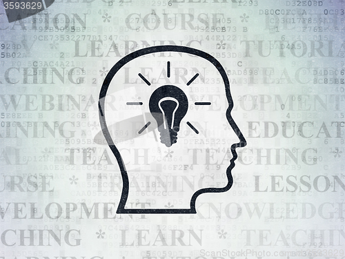 Image of Learning concept: Head With Lightbulb on Digital Paper background