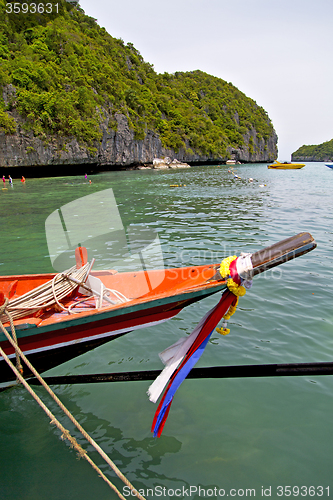 Image of  boat coastline of a  green lagoon and tree     bay  