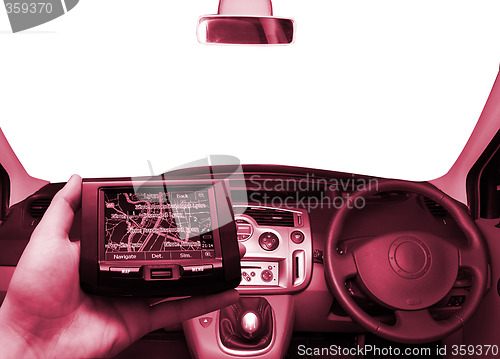 Image of GPS Vehicle navigation system in a man hand.