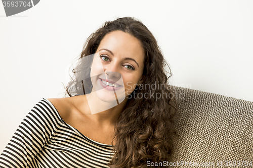 Image of Beautiful woman at home