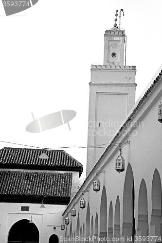 Image of old   brick tower in morocco africa village and the sky