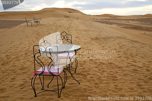 Image of table and seat in desert  sahara morocco    africa yellow sand