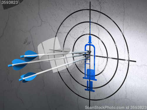 Image of Health concept: arrows in Syringe target on wall background