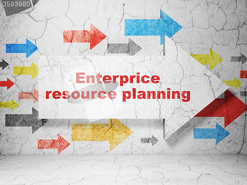 Image of Finance concept: arrow with Enterprice Resource Planning on grunge wall background