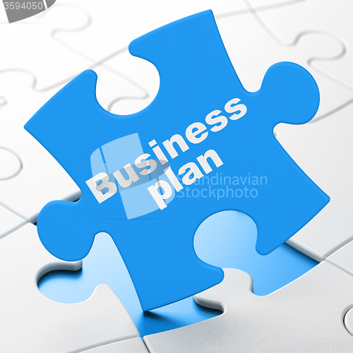Image of Finance concept: Business Plan on puzzle background