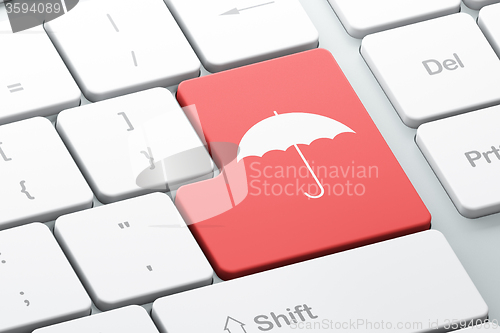 Image of Privacy concept: Umbrella on computer keyboard background