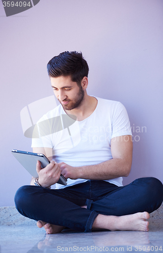 Image of student working on tablet