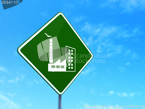 Image of Finance concept: Industry Building on road sign background
