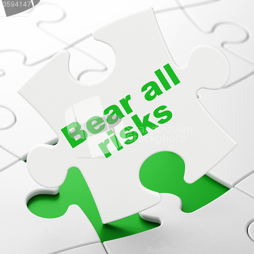 Image of Insurance concept: Bear All Risks on puzzle background