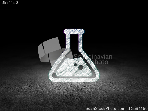 Image of Science concept: Flask in grunge dark room