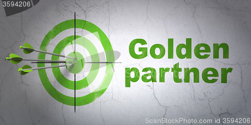 Image of Business concept: target and Golden Partner on wall background