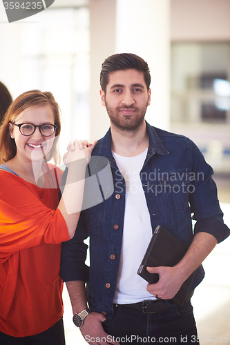 Image of students couple standing together