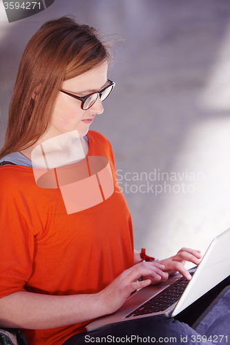 Image of student girl with laptop computer