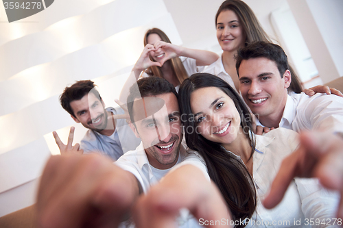 Image of group of friends taking selfie