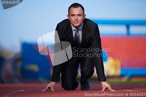 Image of business man ready to sprint