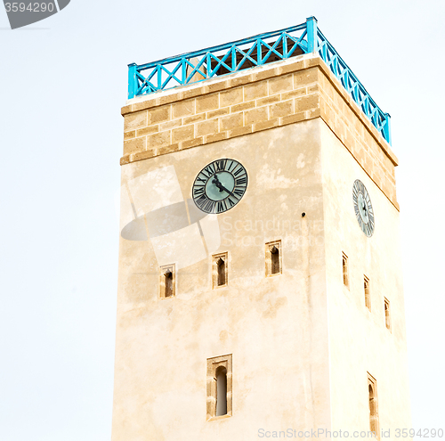 Image of old brick tower in morocco africa village and the sky
