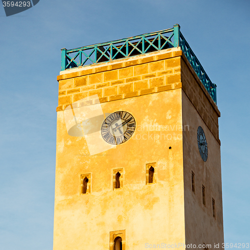 Image of old brick tower in morocco africa village and the sky