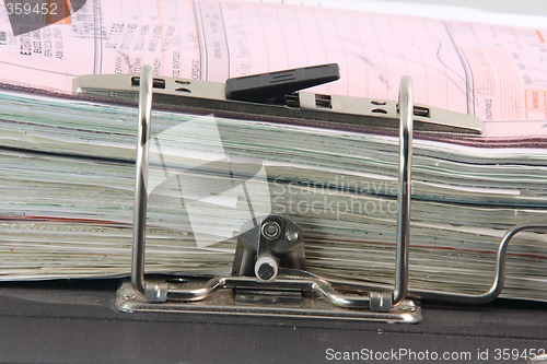 Image of binder and documents